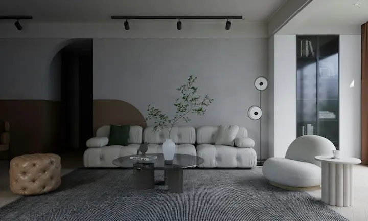 Minimalist living room with arched wall niche, white boucle sofa, and neutral color palette.