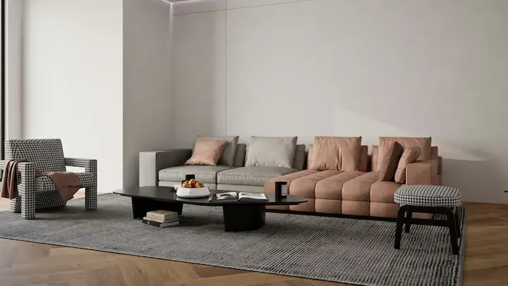 Earth-toned living room with modern sofa, curved furniture, and soft lighting.