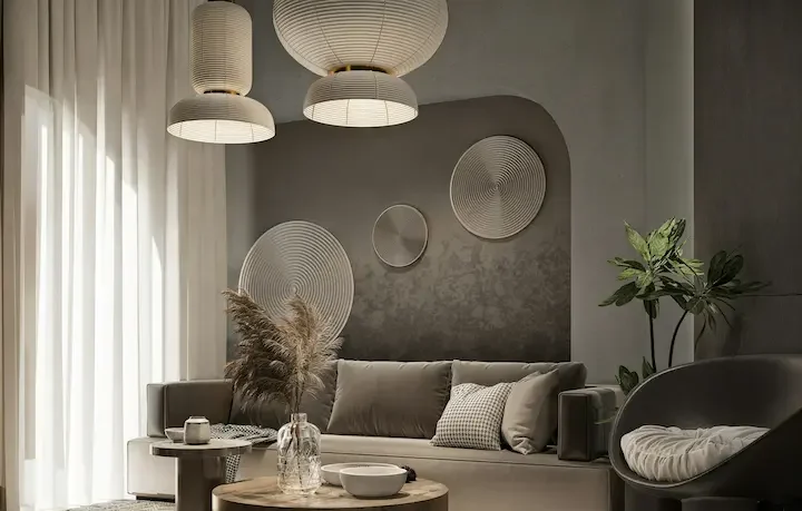 Modern minimalist living room with soft beige tones, natural light, and curated furniture.