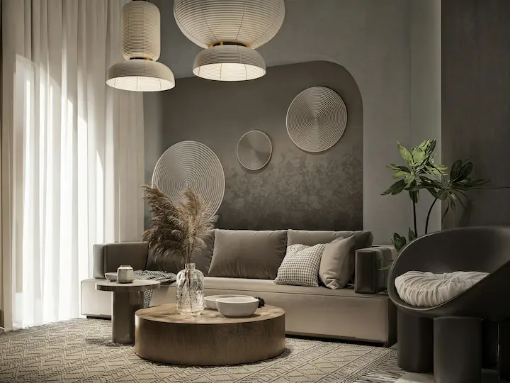 Modern minimalist living room with soft beige tones, natural light, and curated furniture.