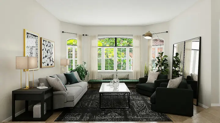 Modern living room with a gray and black L-shaped sofa, wooden flooring, and white walls.