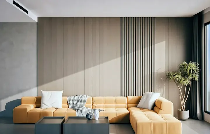 Sophisticated neutral minimalist living room with vertical wood slat accent wall and tan modular sectional sofa